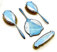 Three Art Deco hallmarked silver (Birmingham 1931) dressing table brushes along with a matching