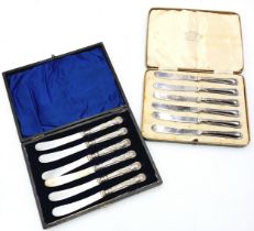 Two cased sets of silver handled butter knives