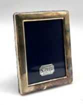 A small sterling silver picture frame -