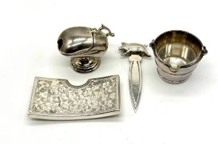 A hallmarked silver curved card case along with a novelty  bookmark with pig header and silver