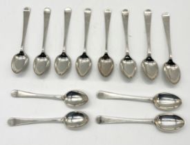 A set of twelve hallmarked silver (Sheffield 1923) coffee spoons - total weight 190g.