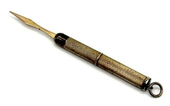 A hallmarked silver extending toothpick