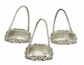 A hallmarked set of three decanter labels, Sherry, Whisky and Gin - total weight 43.53g
