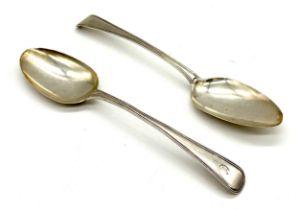 A Georgian pair of hallmarked silver serving spoons (London 1813, Thomas Hayter) - total weight