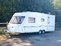 A Bessacarr Cameo 550GL twin axel touring caravan, with fitted interior, kitchen, converting
