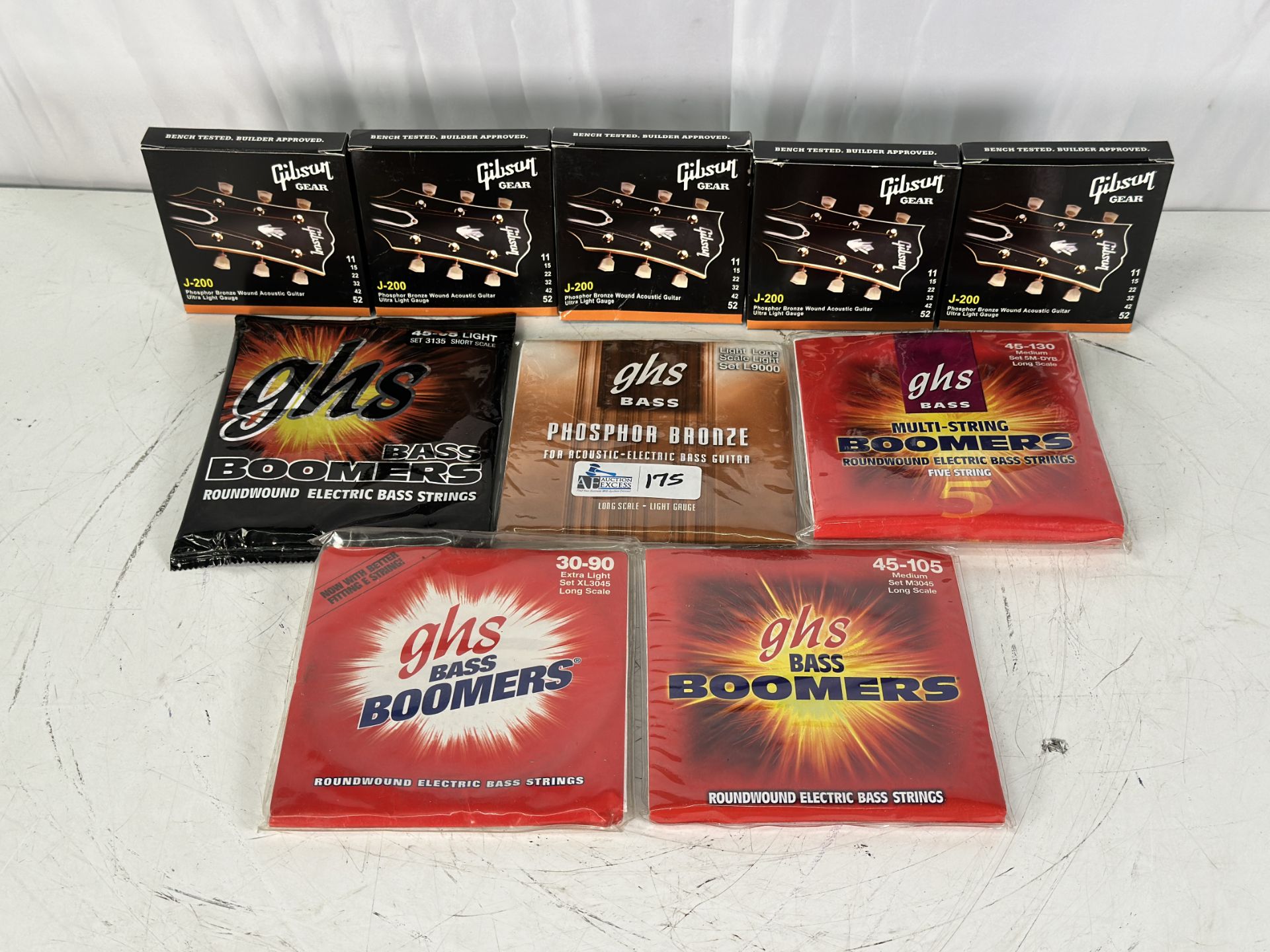 Misc Guitar Accessories including GHS Bass Boomers Roundwound 45-95 Light, GHS 45-130, Gibson J-200