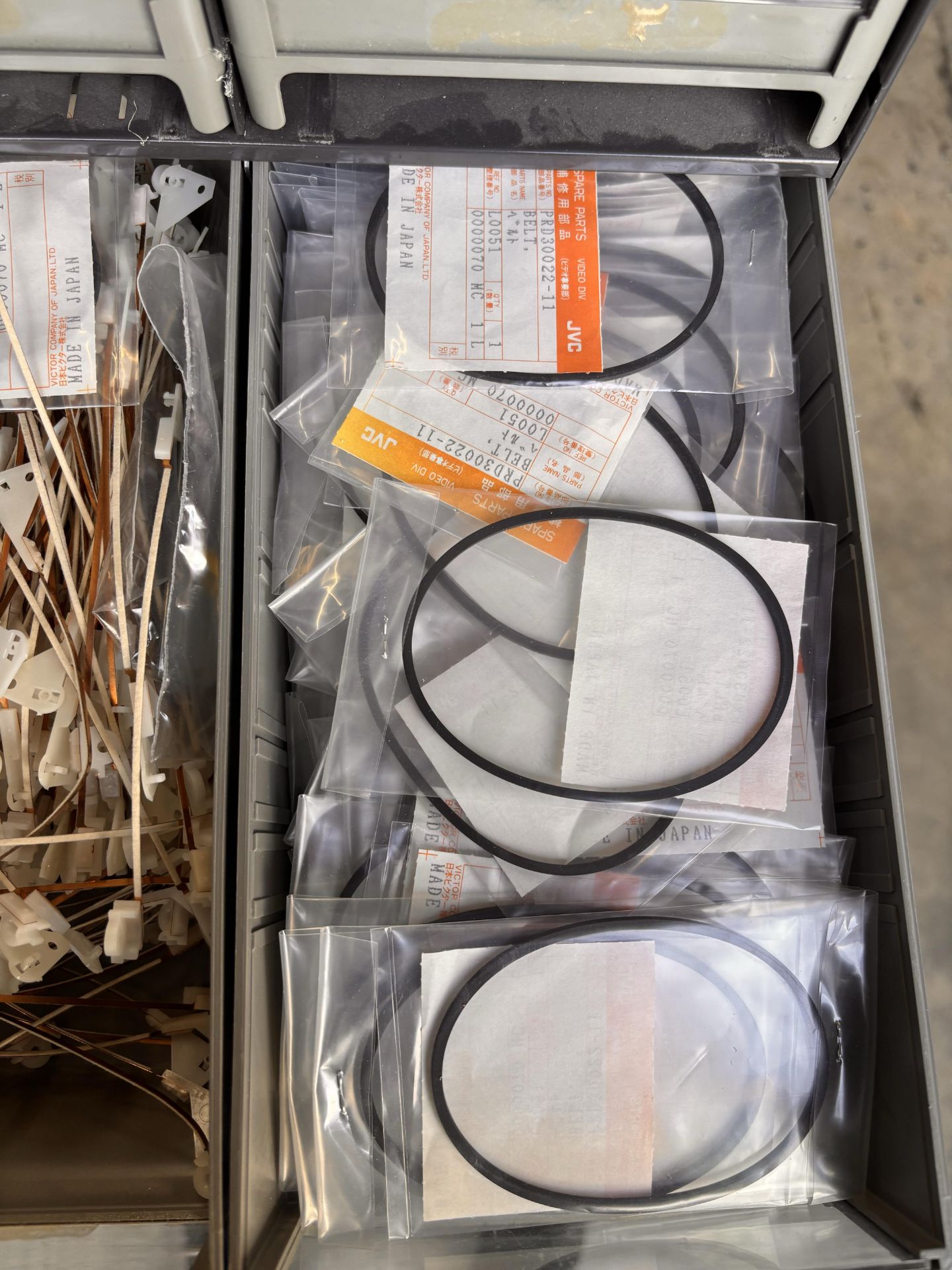 Parts Cabinet w/ NOS JVC Professional Video Spare Parts Lot - VCR Repair: Belts, Motors, Pinch Rolle - Image 10 of 16