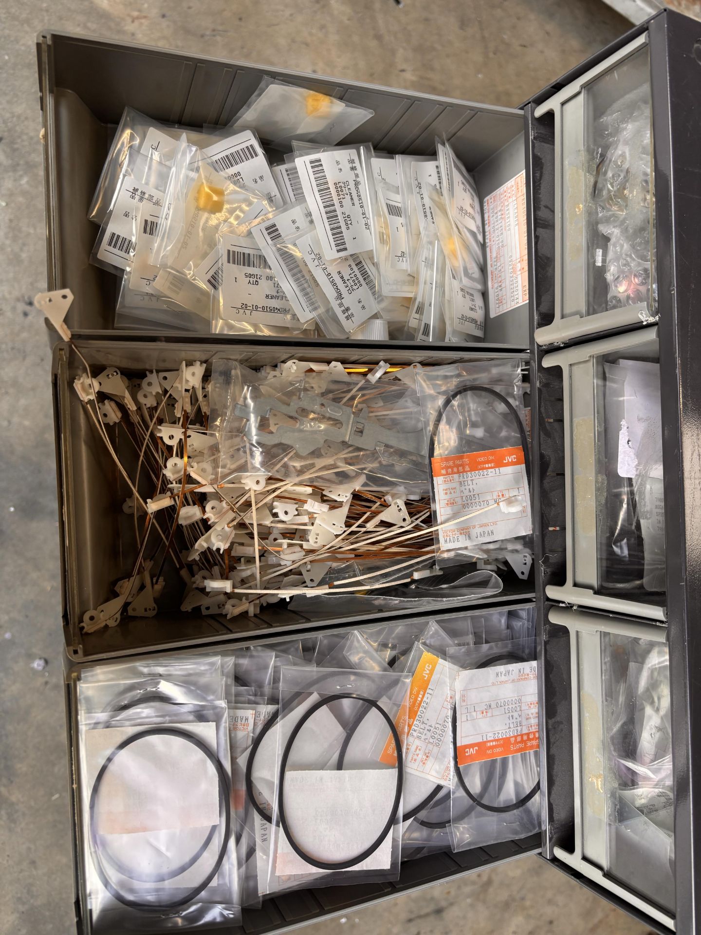 Parts Cabinet w/ NOS JVC Professional Video Spare Parts Lot - VCR Repair: Belts, Motors, Pinch Rolle - Image 9 of 16