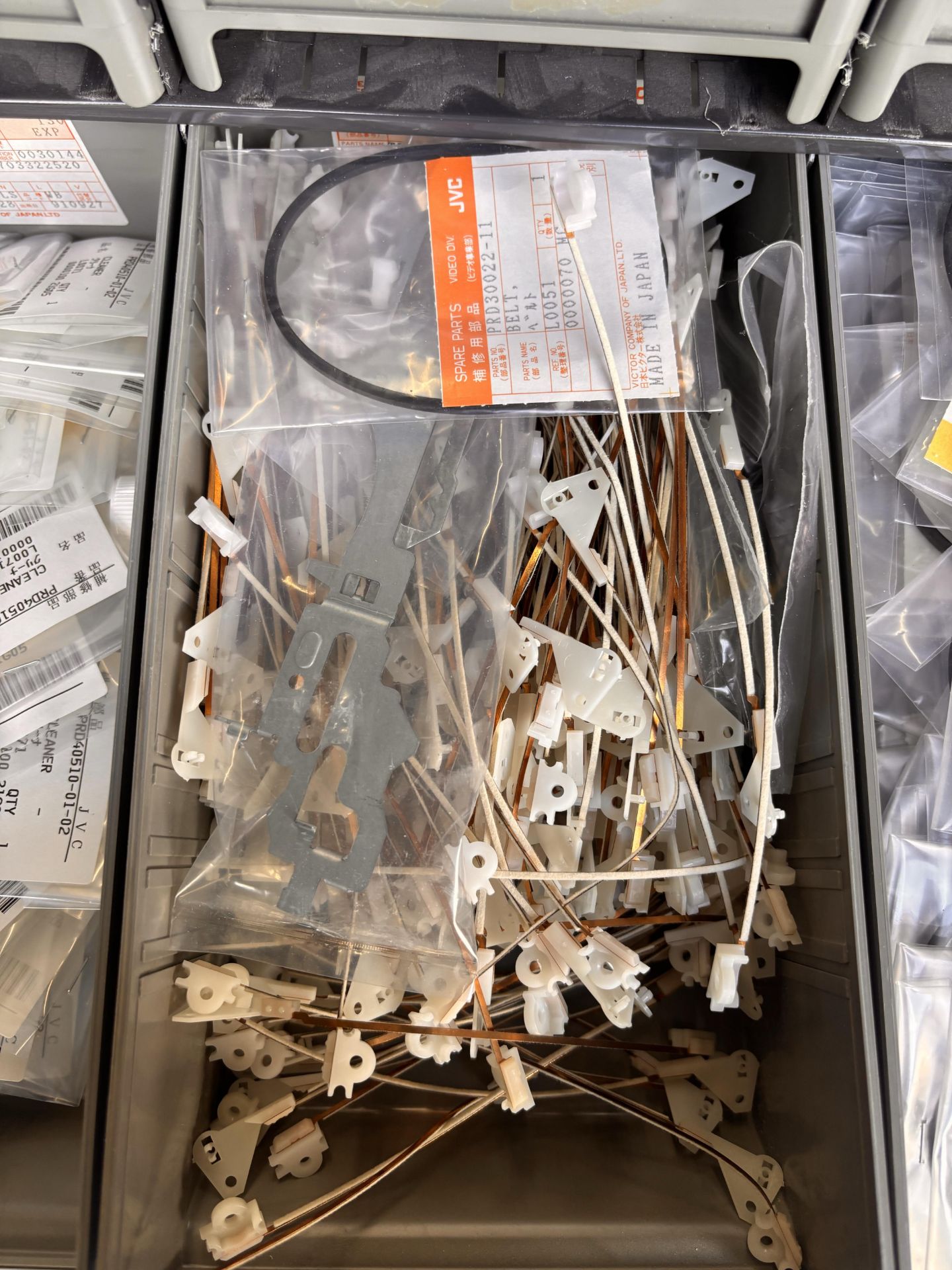 Parts Cabinet w/ NOS JVC Professional Video Spare Parts Lot - VCR Repair: Belts, Motors, Pinch Rolle - Image 11 of 16