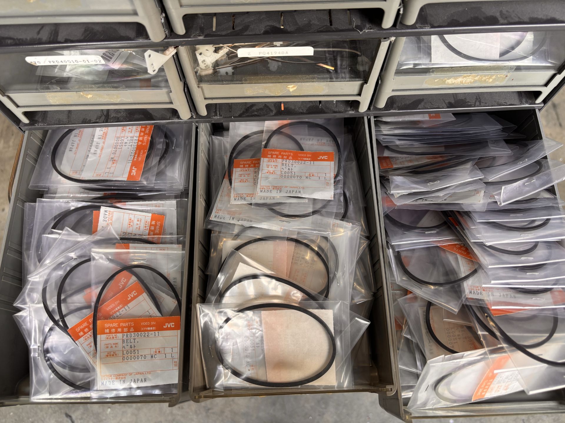 Parts Cabinet w/ NOS JVC Professional Video Spare Parts Lot - VCR Repair: Belts, Motors, Pinch Rolle - Image 13 of 16