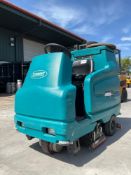TENNANT INDUSTRIAL MICRO-RIDER SWEEPER MODEL 7100; ELECTRIC; APPROX 36 VDC; RUNS AND OPERATES