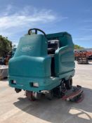 TENNANT INDUSTRIAL MICRO-RIDER SWEEPER MODEL 7100; ELECTRIC; APPROX 36 VDC; APPROX 65 A; RUNS AND