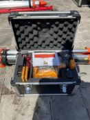 UNUSED SELF-LEVELING ROTARY LASER IN CARRYING CASE , OPERATING MANUAL MEASURING STICK & STAND INC...