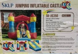UNUSED INFLATABLE BOUNCE CASTLE MODEL SKJIC350; JUMPING BOUNCE HOUSE; APPROX WEIGHT 27.5 LBS; APP...
