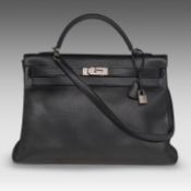 A Hermes Kelly 40 retourne in black veau epsom handbag with CK hardware 27 x 40 x 13 cm. (10.63 x 15