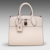 A Louis Vuitton Ivory Ostrich City Steamer PM handbag, with silver hardware, H 23,5 - W 27 - D 12,5