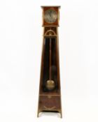 Delicate Art Nouveau small table clock, c. 1910, case tapering upwards on short feet with flat bras