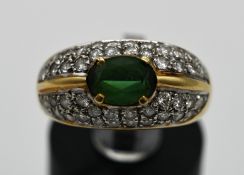 14 K Ring mit Smaragd und Diamanten