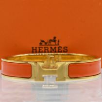 Bangle with orange enamel in original box, Hermès, Paris, 21st century