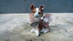 Kleine Porzellanfigur Hund Hersteller
