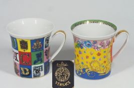 Zwei VERSACE Tassen. 1) VERSACE Holiday Alphabet 2019. 2) Luxuriöse Primavera Tasse