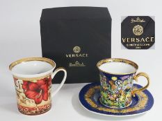 Zwei Weihnachtstassen: 1) Rosenthal meets VERSACE 2016. 2) Die Weihnachtstasse mit Untertasse 1997,