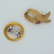 2 Broschen je GG 18ct.