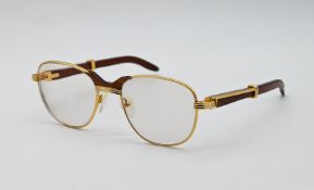 1 Lesebrille CARTIER Metall, z. T. vergoldet z.T. mit Holz, 