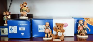 4 Hummelfiguren und zugehöriger Steiff-Bär