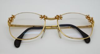 1 Damenbrille gest. GG 750 mit Brillant-Besatz bis zu 0,05 ct. und Etui, Asp.