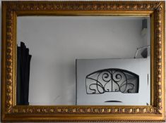 1 Spiegel mit vergoldetem Holzrahmen, ca. H 80 x B 110cm,