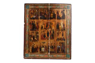A 19TH CENTURY RUSSIAN ICON DEPICTING THE TWELVE FEASTS OF THE ORTHODOX CHURCH