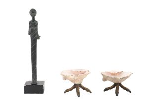 AN ETRUSCAN STYLE BRONZE FILIFORM FIGURINE