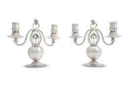 GEORG JENSEN: A PAIR OF DANISH SILVER TWO-LIGHT 'POMEGRANATE' PATTERN CANDELABRA incuse no 324, post