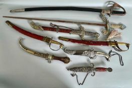 Konvolut 8 Dekowaffen, überwiegend Säbel und Dolche, wohl 20. Jahrhundert