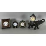 Tischuhren, Reiswecker und Figurenuhr Konvolut, 2x Cartier Paris, Asiatika Elefant und Taschenuhr