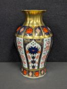A Royal Crown Derby Imari 1128 pattern lobed baluster vase, solid gold band, 21cm, printed mark in