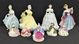 A Royal Doulton figure, Southern Belle HN 2425, modelled by Peggy Davies; others, Ninette HN2379;