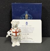 A Royal Crown Derby miniature bear model, England Footballer, number 6 (Bobby Moore's number),