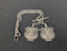 A silver double Albert chain, with fobs for Beccles Hospital Football Cup, 1922-23