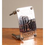 A Rolls-Royce engine plate or badge, 11cm long, mid 20th century