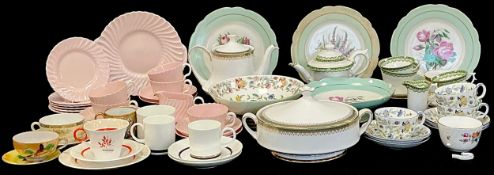 A Royal Worcester tea service for three, including teapot, milk jug, sucrier, cups and saucers;