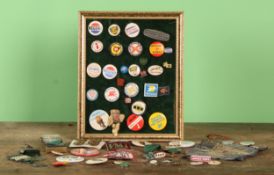 A collection of mostly motoring related pin badges and tie pins, including Jaguar, BP, ESSO,