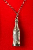 Advertising - Coca-Cola - a silver pendant necklace, modelled as a labelled bottle, 3cm high