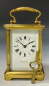 A Mappin & Webb brass cased carriage time piece, white dial, bold Roman numerals,11cm high excluding