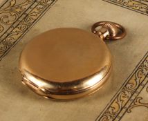 An early 20th century rolled gold hunter pocket watch, enamel dial inscribed Waltham, keyless