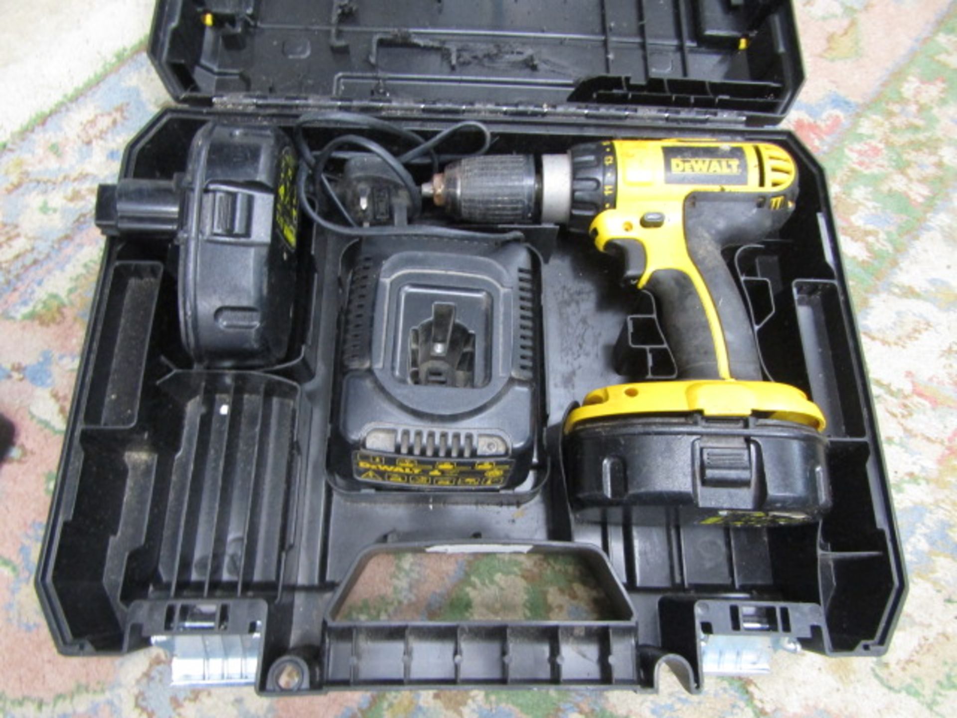 DeWalt cordless drill in case with charger and battery