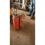 Pair of vintage rivetted fire extinguishers