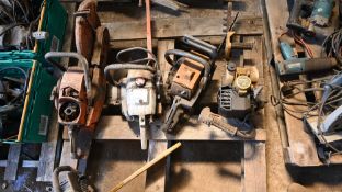 Pallet of chainsaws and pump