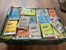 Auto glass guide booklets in bale arm crate